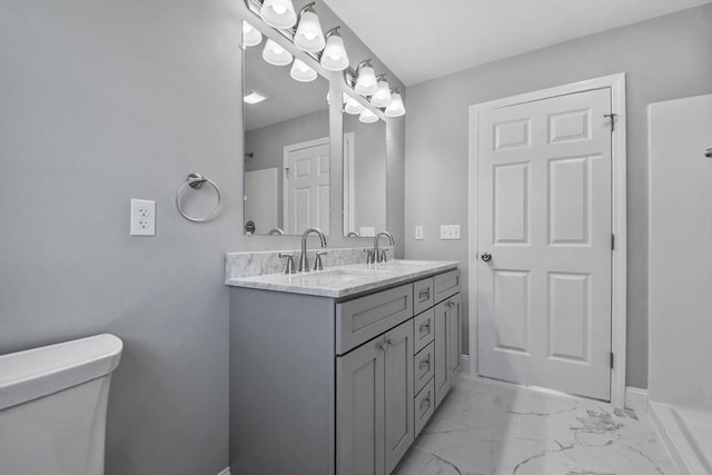 119 Tripp St, Fall River, MA 02724 - bathroom featuring marble finish flooring and double vanity