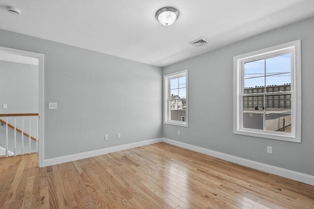 119 Tripp St, Fall River, MA 02724 - empty room featuring wood finished floors and a smoke detector