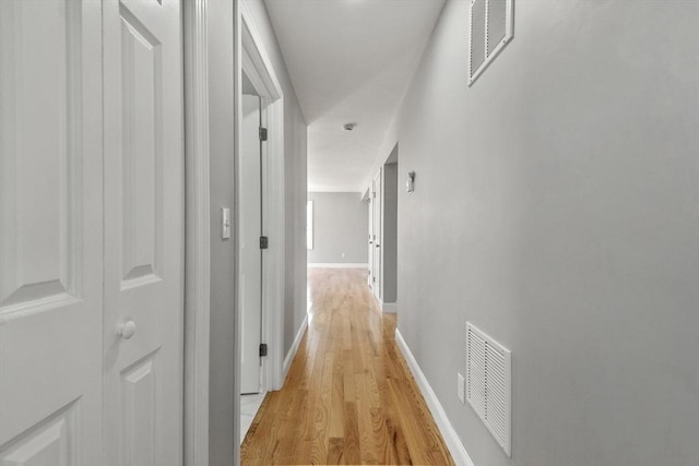 119 Tripp St, Fall River, MA 02724 - hallway featuring light wood finished floors and baseboards