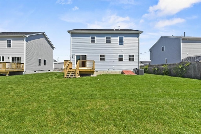 119 Tripp St, Fall River, MA 02724 - rear view of house with a deck