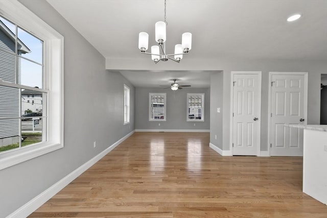 119 Tripp St, Fall River, MA 02724 - unfurnished dining area with a chandelier, ceiling fan, light wood-type flooring, and recessed lighting