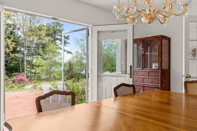 dining room featuring a chandelier