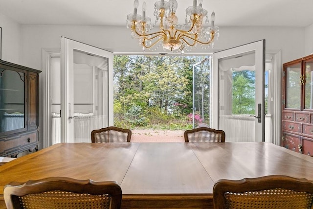 dining room featuring a chandelier