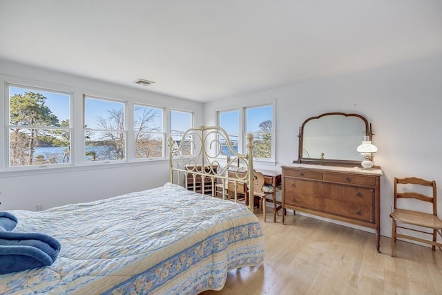 bedroom with light wood-style flooring
