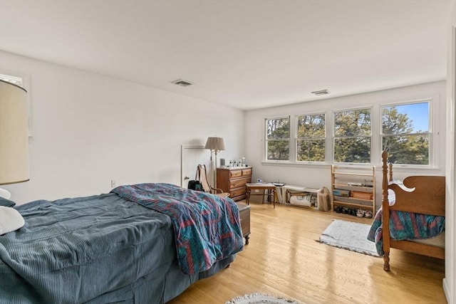 bedroom featuring light wood-style flooring