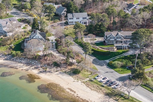 aerial view of property's location with a large body of water