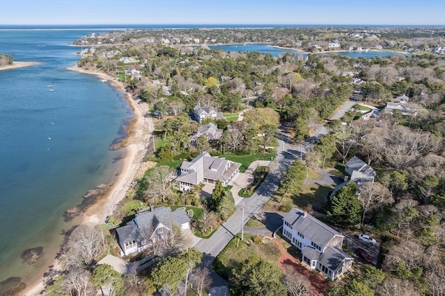 aerial overview of property's location featuring a large body of water and nearby suburban area