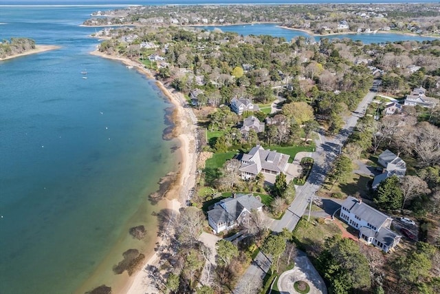 aerial overview of property's location featuring a nearby body of water and nearby suburban area