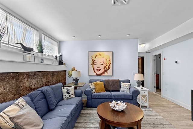 2111/2 Bradford St, Provincetown, MA 02657 - living room featuring light wood finished floors, baseboards, and recessed lighting