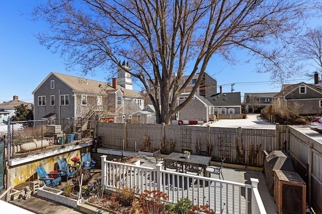 2111/2 Bradford St, Provincetown, MA 02657 - view of patio / terrace featuring a residential view, a fenced backyard, and outdoor dining space