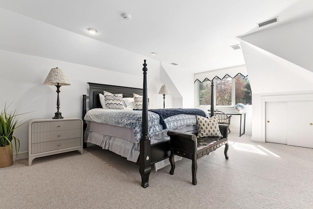carpeted bedroom with visible vents