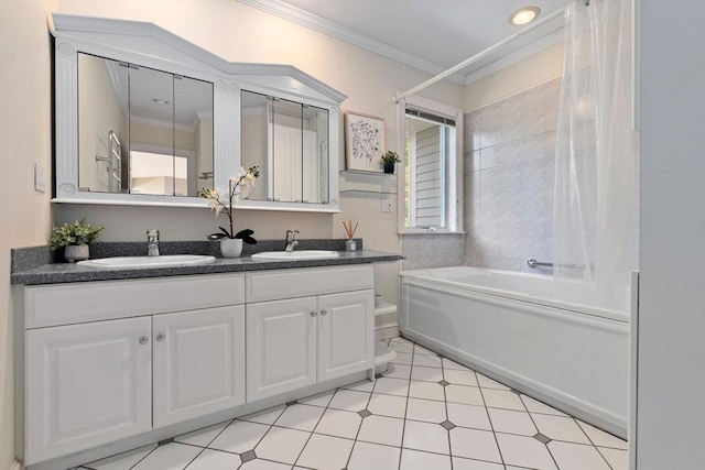 full bath with crown molding, a sink, and double vanity