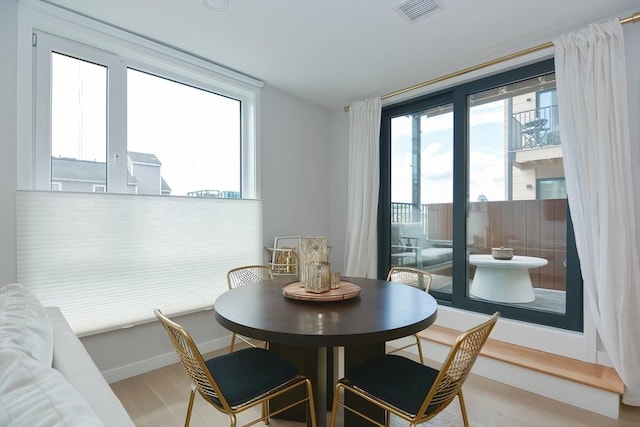 457 W Broadway Unit 209, Boston, MA 02127 - dining room featuring wood finished floors and baseboards