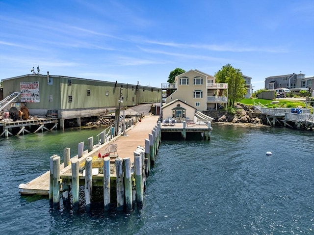 dock area with a water view