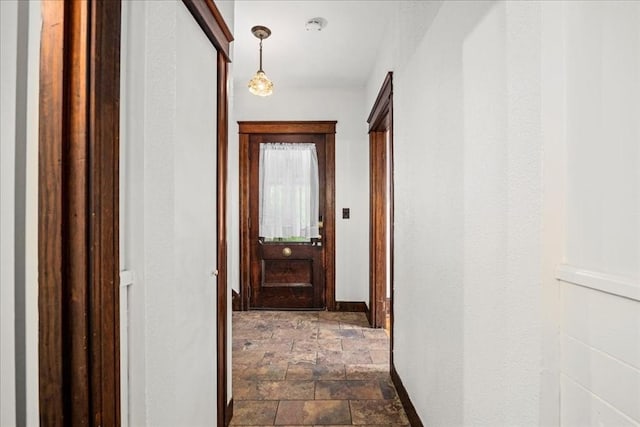 7 Vancroft Ave, Shrewsbury, MA 01545 - corridor featuring baseboards and stone finish floor