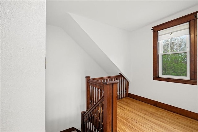7 Vancroft Ave, Shrewsbury, MA 01545 - staircase featuring baseboards, lofted ceiling, and wood finished floors