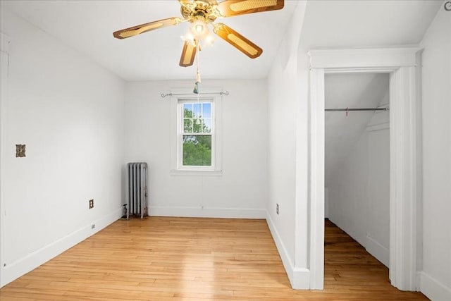 7 Vancroft Ave, Shrewsbury, MA 01545 - unfurnished bedroom featuring light wood-style floors, radiator, baseboards, and ceiling fan