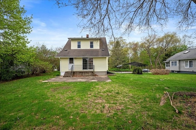 7 Vancroft Ave, Shrewsbury, MA 01545 - rear view of property featuring a detached carport, a yard, and a chimney