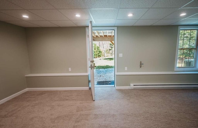20 Warner Rd, Townsend, MA 01469 - carpeted spare room with baseboards, a drop ceiling, and a baseboard heating unit