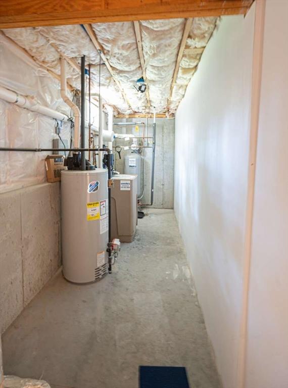 20 Warner Rd, Townsend, MA 01469 - unfinished below grade area featuring gas water heater