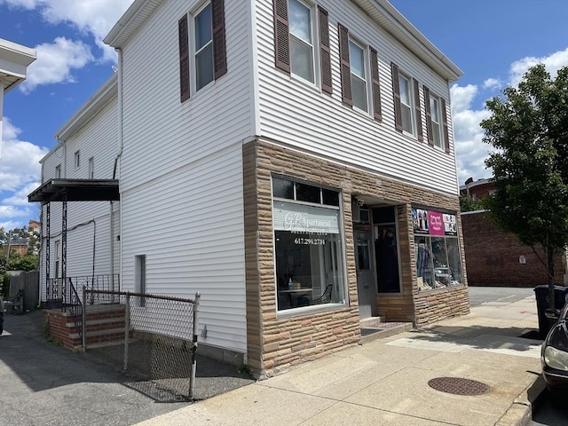 133 Main St, Everett, MA 02149 - view of property exterior with stone siding