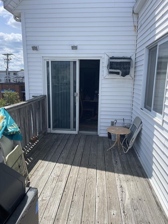 133 Main St, Everett, MA 02149 - deck with a wall mounted air conditioner