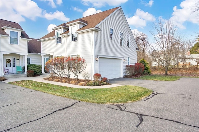 view of property exterior with a garage