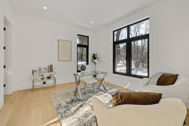 sitting room with light hardwood / wood-style floors