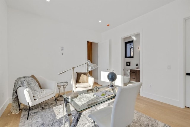 sitting room with light hardwood / wood-style floors