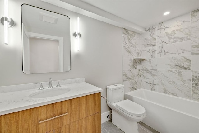 full bathroom featuring tiled shower / bath combo, vanity, tile patterned flooring, and toilet