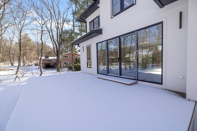 view of yard covered in snow