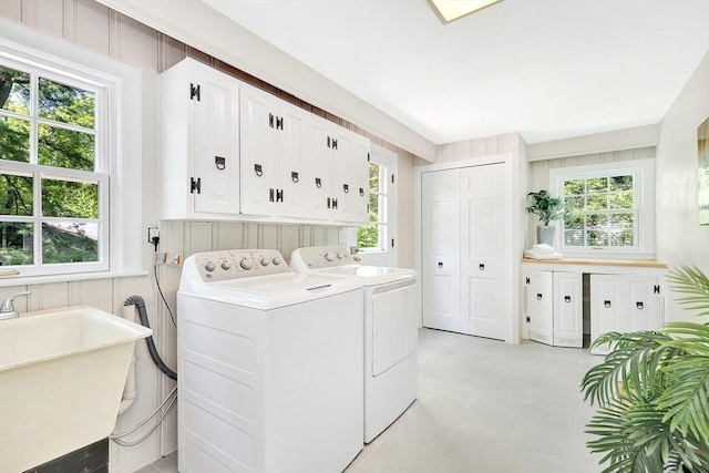27 Lantern Ln, Arlington, MA 02474 - laundry room with independent washer and dryer, cabinet space, and plenty of natural light