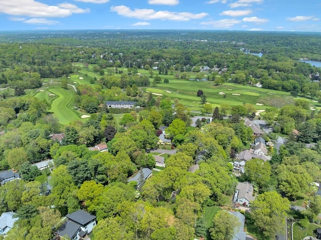27 Lantern Ln, Arlington, MA 02474 - aerial overview of property's location with a golf course, nearby suburban area, a heavily wooded area, and a nearby body of water