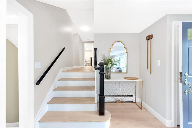 27 Lantern Ln, Arlington, MA 02474 - stairs featuring baseboards and wood finished floors