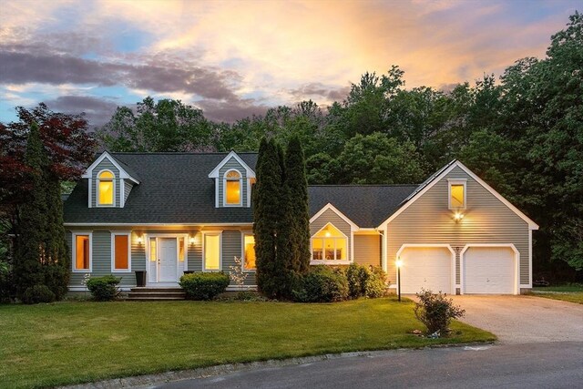 7 Humiston Cir, Westford, MA 01886 - cape cod-style house with asphalt driveway, a front yard, and an attached garage