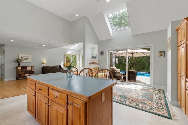 7 Humiston Cir, Westford, MA 01886 - kitchen with high vaulted ceiling, a center island, healthy amount of natural light, a skylight, and recessed lighting