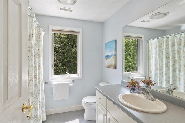 7 Humiston Cir, Westford, MA 01886 - full bathroom featuring vanity, toilet, tile patterned floors, and baseboards