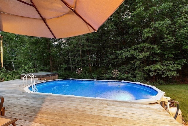 7 Humiston Cir, Westford, MA 01886 - swimming pool featuring a hot tub and a wooden deck