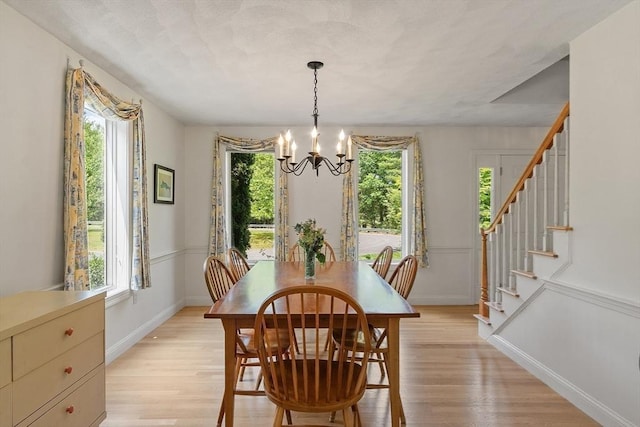 7 Humiston Cir, Westford, MA 01886 - dining room featuring a chandelier, light wood finished floors, stairs, and baseboards