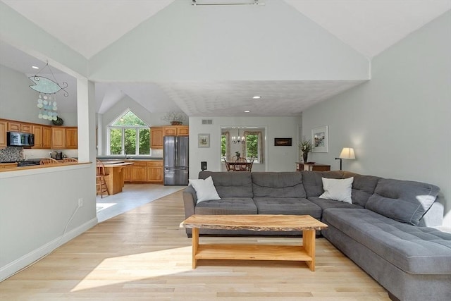 7 Humiston Cir, Westford, MA 01886 - living room with high vaulted ceiling and light wood-type flooring