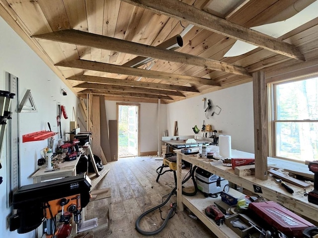 60 Camp Rd, Leverett, MA 01054 - miscellaneous room featuring wooden ceiling, hardwood / wood-style flooring, a workshop area, and beamed ceiling