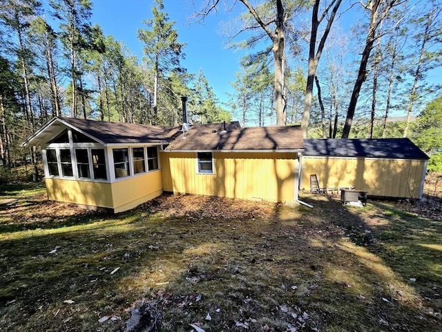 60 Camp Rd, Leverett, MA 01054 - rear view of property featuring a sunroom