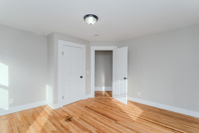 empty room featuring hardwood / wood-style flooring