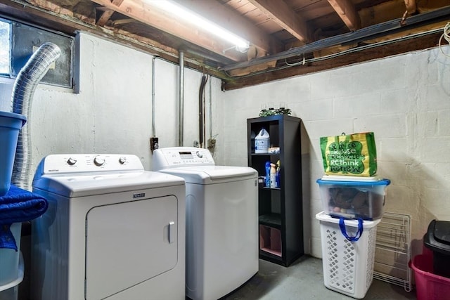 laundry area featuring laundry area and washer and clothes dryer