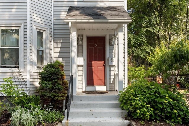 5 Hinckley St Unit 2, Somerville, MA 02145 - doorway to property featuring roof with shingles