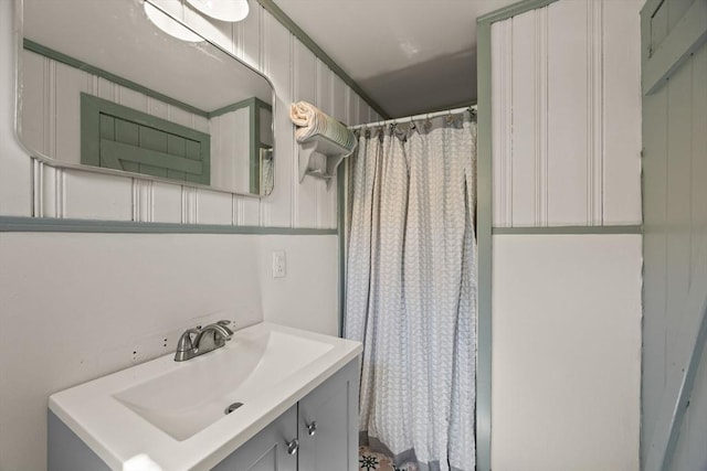 full bath with vanity and a shower with curtain