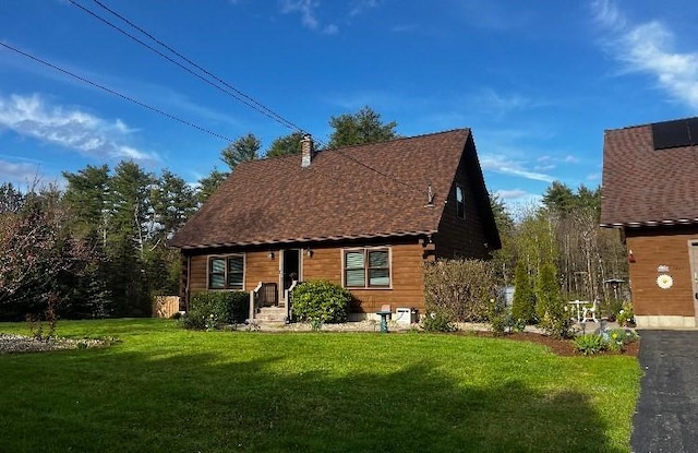 1472 Pleasant St, Athol, MA 01331 - view of front of home with a front yard, a shingled roof, and a chimney