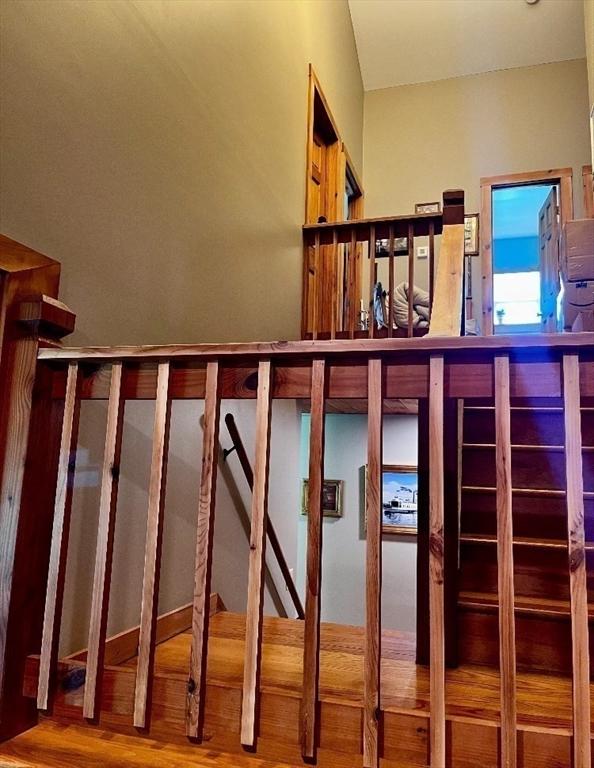 1472 Pleasant St, Athol, MA 01331 - staircase with wood finished floors