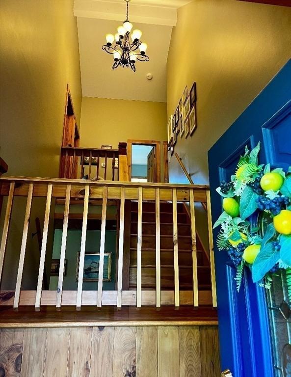 1472 Pleasant St, Athol, MA 01331 - stairs with a chandelier and high vaulted ceiling