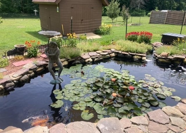 1472 Pleasant St, Athol, MA 01331 - view of yard featuring a storage shed and a garden pond